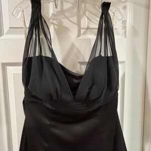 A black bridesmaid dress from David’s Bridal. Purchased 2016 and only worn once.